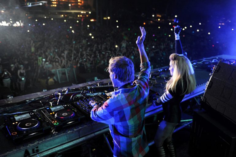 Mainstage Madge: Madonna flanks Avicii at Ultra. By Seth Browarnik/worldredeye.com