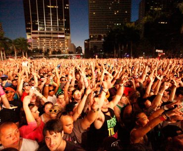 Reach for the Sky: Ultra fans in downtown Miami. By Justin Jarchow-Misch